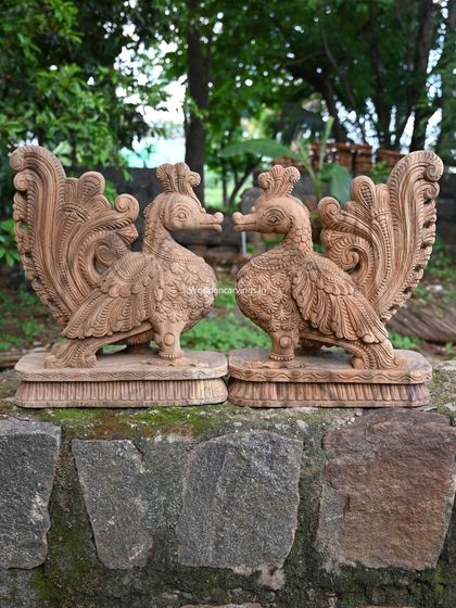 A pair of 19-inch Hamsa sculptures, arranged to face each other, creating a symmetrical and harmonious display.