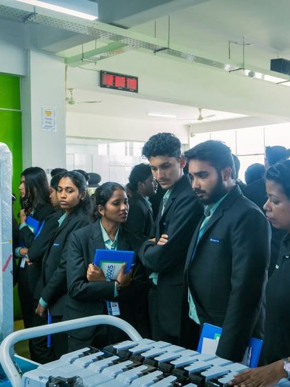 Students observing the calibration and testing phase of my energy meters during their industrial visit.
