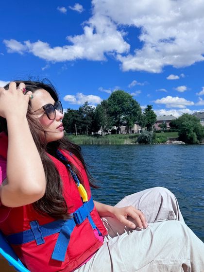 A relaxed moment on a boat, enjoying the sunny weather.