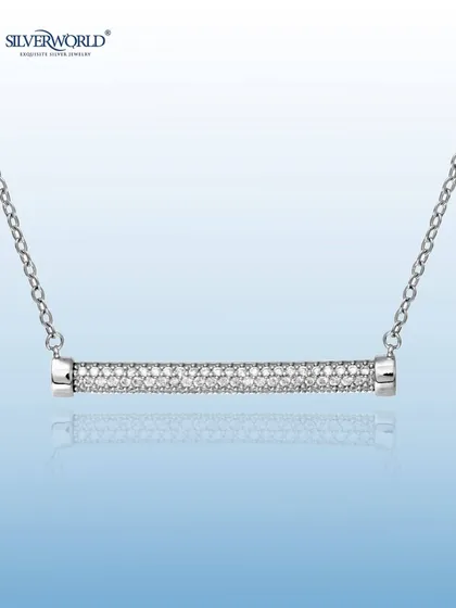 A modern and minimalist bar pendant, this piece is adorned with tiny marcasite stones for a subtle, vintage sparkle. It hangs on a delicate chain, making it perfect for office wear or layering.