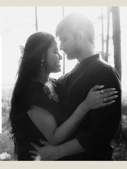 A black and white collage focusing on an intimate embrace and windswept hair. These artistic shots highlight the romantic and sensory details of a beach pre-wedding shoot.