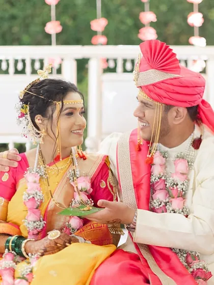A sweet, interactive moment between the bride and groom during their ceremony.