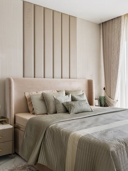 A beautifully appointed bedroom showcasing our signature style of quiet luxury. This space combines layered textures, a soothing color palette, and bespoke furniture to create a personal sanctuary for rest and relaxation.