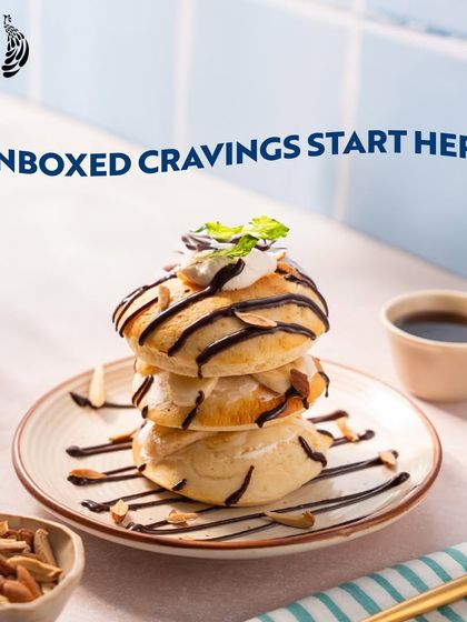 Unboxed cravings start here at Blue Tokai. This stack of delicious, cream-filled pastries drizzled with chocolate is the perfect treat to accompany your coffee.
