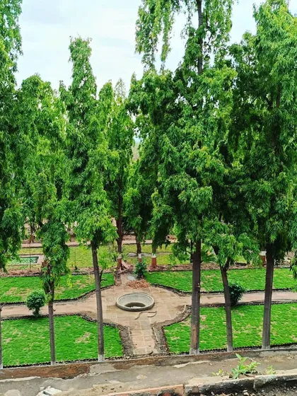 Looking down on the symmetrical garden design at Dalal Bagh, showcasing the precise layout of paths and lawns.