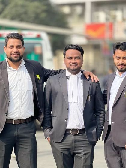 With my teammates, showcasing the unity and spirit of our legal team.