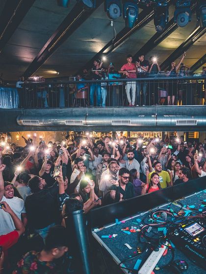 The iconic phone-light moment, seen from my perspective. It's a beautiful sight to see the whole club lit up by the crowd.