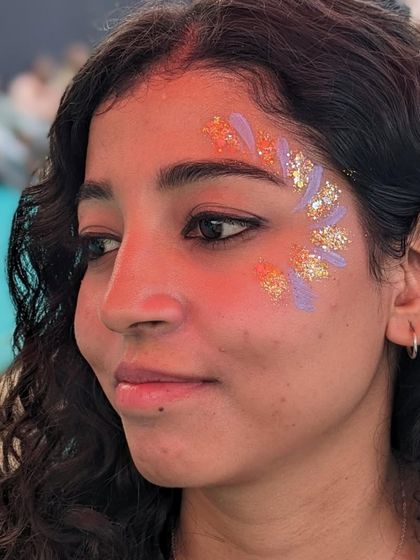 A beautiful abstract design using purple and orange paints with gold and silver leaf glitter for a textured, artistic look.