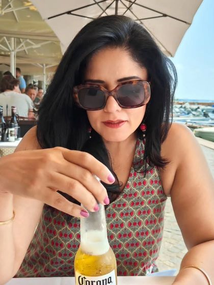 On a relaxed day at Lake Garda, I wore this printed cotton halter dress. It's an old favourite that has been on many holidays with me, proving that great pieces last.