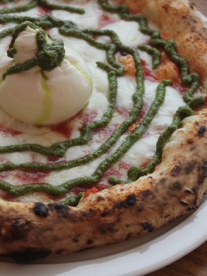 Fresh, creamy burrata meets the vibrant flavours of basil pesto on our classic Neapolitan crust.