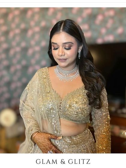 A stunning engagement party look for a client. The focus is on shimmering eyes and a flawless base, paired with a diamond necklace for ultimate glam.