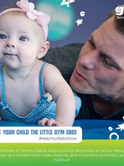 A father and his baby share a moment during tummy time on a soft mat. These early interactions are key for building strength, bonding, and making physical activity a natural part of life.