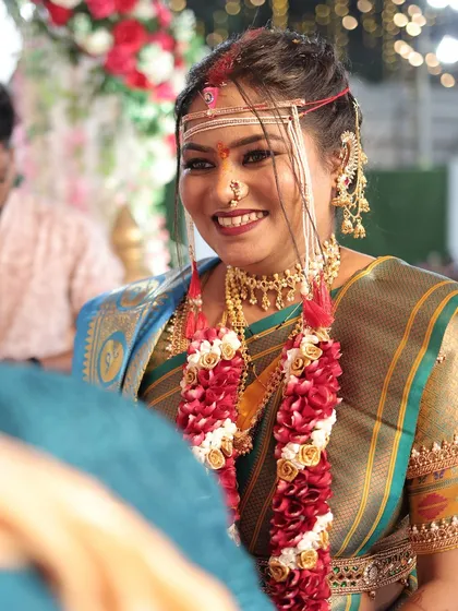 The bride's radiant smile is the focus of this photo. The makeup is designed to enhance, not mask, your natural beauty.