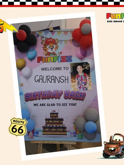 Every party gets a personalized welcome. For this Cars-themed birthday bash, I created a custom welcome sign featuring the birthday boy's photo to make him feel extra special.