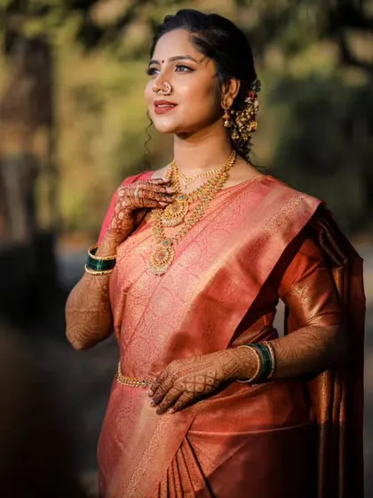 A beautiful outdoor portrait of the bride, her skin glowing in the natural light.