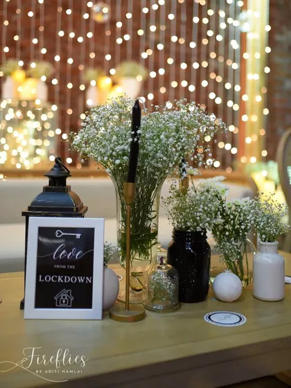 Another personal detail, "Love from the Lockdown," hinting at how the couple's relationship blossomed. These storytelling elements make the decor meaningful.