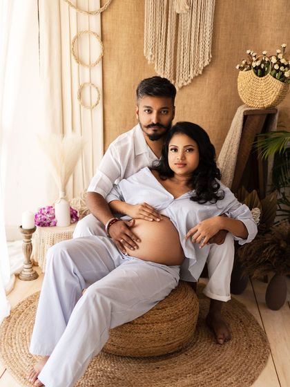 A strong and confident pose from the couple, showcasing their partnership and shared excitement.