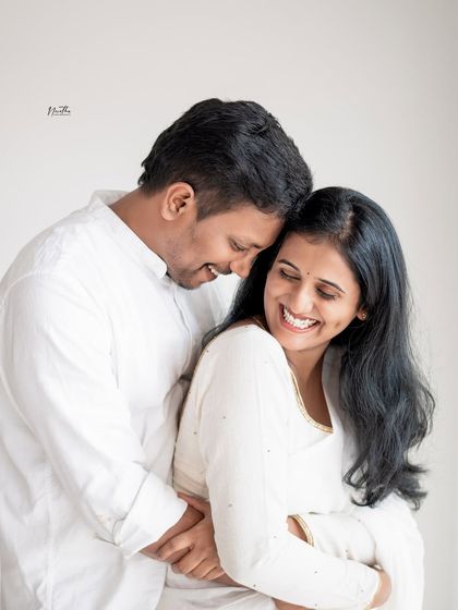 A sweet and simple portrait of a couple, capturing their happy smiles.