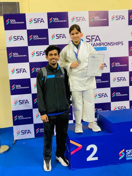 Drishti Goyal with her silver medal in the U-19 category at the SFA Championship. A fantastic performance against tough competitors.