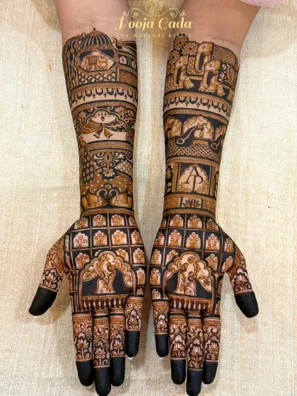 Another beautiful bridal design without human figures. This one features intricate jaali work on the palms, combined with traditional elephant and bird motifs on the forearms, showcasing a different style of non-figurative art.