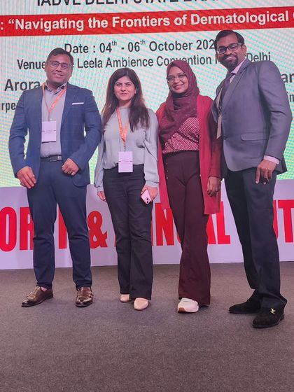 Dr. Amrendra Kumar and Dr. Kavish Chouhan with colleagues at the DERMAZONE NORTH conference. We believe in collaborating and sharing knowledge with our peers.