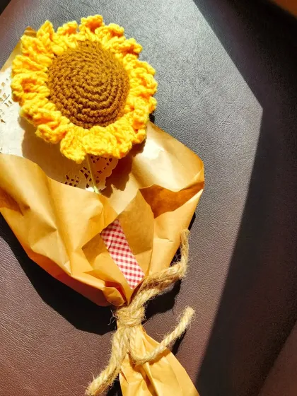 Bringing a little sunshine into your life, one stitch at a time. This single wrapped sunflower looks so cozy and rustic.