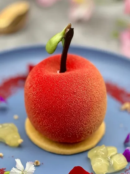 We believe in turning food into edible art. This dessert, crafted to look exactly like a real apple, is a testament to our team's creativity and skill, offering a delightful surprise with its hidden layers of flavour.
