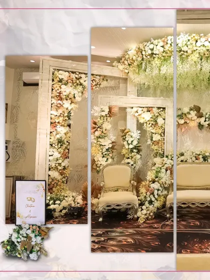 Another view of the magnificent framed floral stage. The design creates a sense of depth and grandeur, providing a luxurious and romantic setting for the couple's special evening.