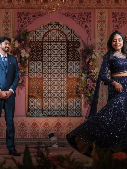 A dynamic shot of Dr. Akshara twirling in her lehenga. The movement shows off the flow of her outfit and the elegance of her overall look.