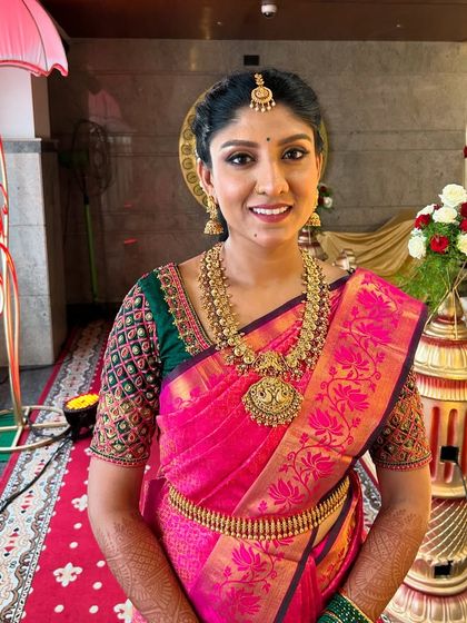 A smiling portrait of my client, looking absolutely stunning for her pre-wedding event. The makeup is designed to last through all the rituals while looking fresh and beautiful.