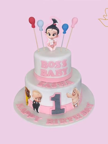 A fun two-tier Boss Baby cake for a first birthday. This design is perfect for the little boss in your life, featuring characters from the popular movie.