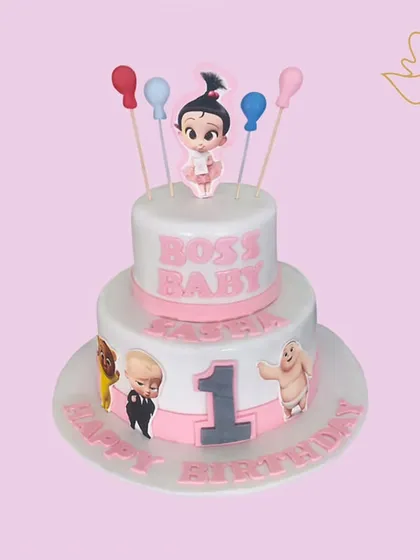 A fun two-tier Boss Baby cake for a first birthday. This design is perfect for the little boss in your life, featuring characters from the popular movie.