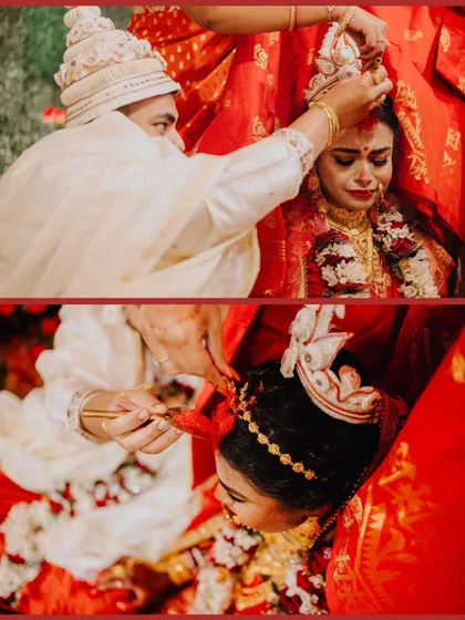 The profound emotion of the Sindoor Daan, a pivotal moment in Rohan and Ananya's Bengali wedding. The bride's tearful smile tells a story of love, transition, and deep-rooted tradition.