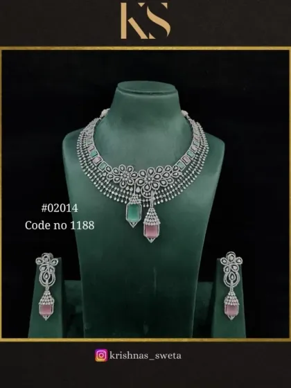 The same floral American diamond set, here with mint green and pink dual-toned drops. This adds a subtle pop of color to the elegant design.