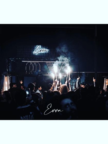 The crowd at EVVA celebrating New Year's Eve with sparklers. Creating a memorable atmosphere for special occasions is a key part of my job as a resident DJ.