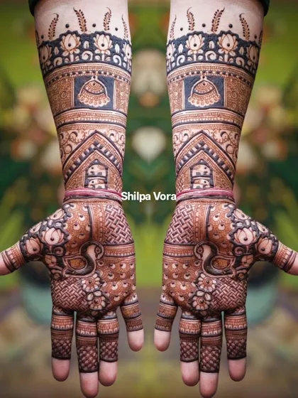 The same full-arm bridal design against a different background, highlighting its grandeur.