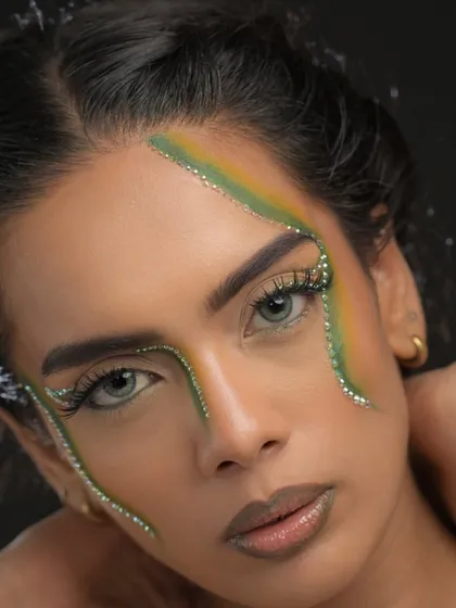 A direct-to-camera shot that highlights the precision of the rhinestone application and the unique color combination.
