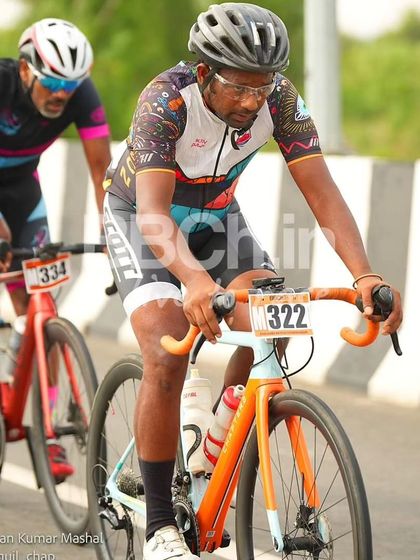 A group of masters riders, enjoying the race and the scenic route.