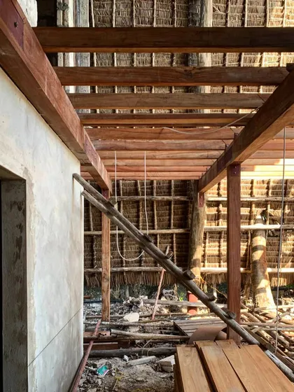 The interior structure of the Kizikula spa during construction. You can see the intricate timber framework that supports the makuti thatched roof, creating a beautiful, textured ceiling.