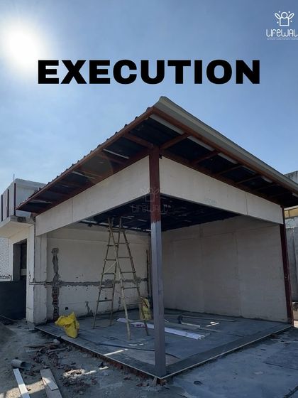 An "Execution" shot showing the framework of a rooftop room going up. This is the solid foundation upon which the final beautiful structure is built.