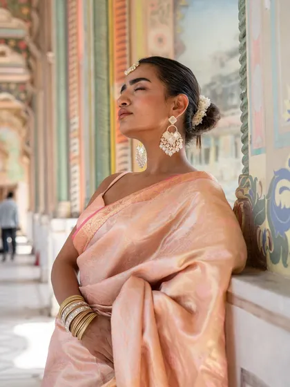 Another look at our beautiful baby pink Banarasi silk saree. The perfect choice for when you're in a classic Indian fashion mood.