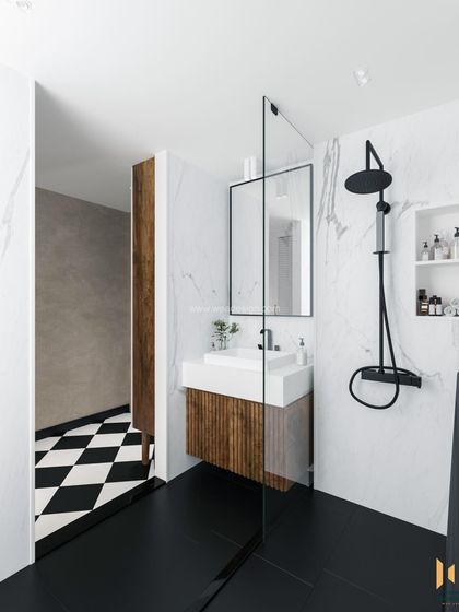 A view from the vanity area into the shower, showing the seamless glass partition and the consistent black-and-white theme.