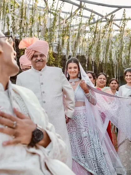 The first look is not just for the couple. This is the groom's reaction as he sees his bride walking towards him for the first time. Capturing this raw, unfiltered emotion is at the heart of my storytelling.
