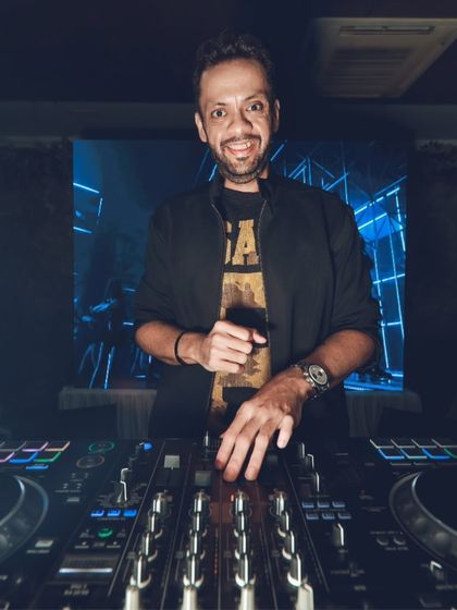 A smile for the camera while keeping the beats flowing. I love interacting with the crowd and making sure everyone is having a great time.