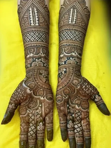This design is a beautiful example of symmetrical bridal art, where both hands mirror each other perfectly. It requires precision and skill, which I have perfected over 15 years.
