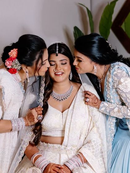 A heartwarming moment between the bride and her family. Her minimalist makeup for the Gurudwara wedding was all about fresh skin and natural beauty.