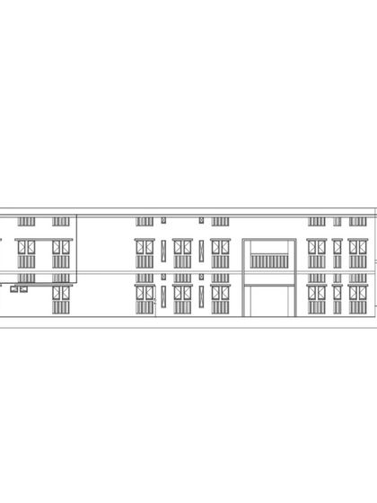 A courtyard-facing elevation of Buddhi School, showing the corridors and openings that connect the classrooms to the central play area.