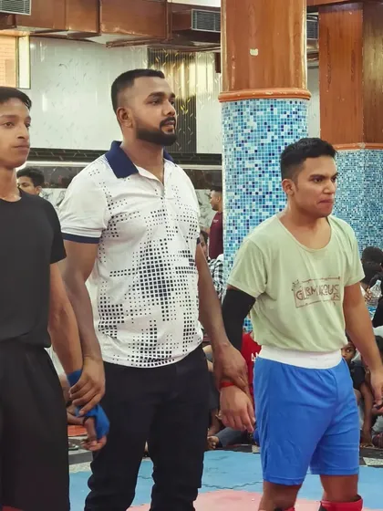 That winning moment. Raising the hands of my fighters after a hard-fought match.