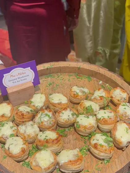 My popular Creamy Mushroom Vol-au-vents, garnished with fresh parsley. These bite-sized savory pastries are a sophisticated addition to any event.