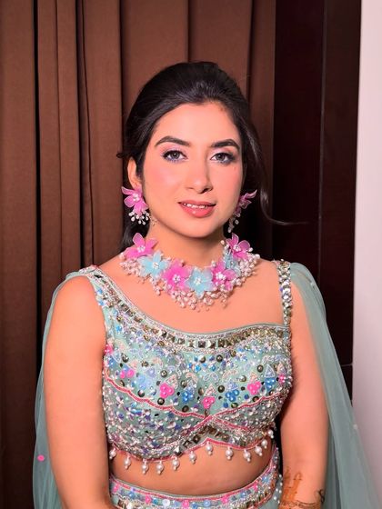 A close-up of Surbhi's Mehendi makeup. The look is bright and fresh, perfect for a daytime event.